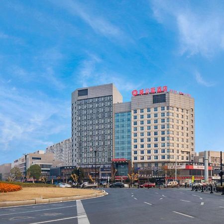 Huzhou Wealth Hotel Bagian luar foto