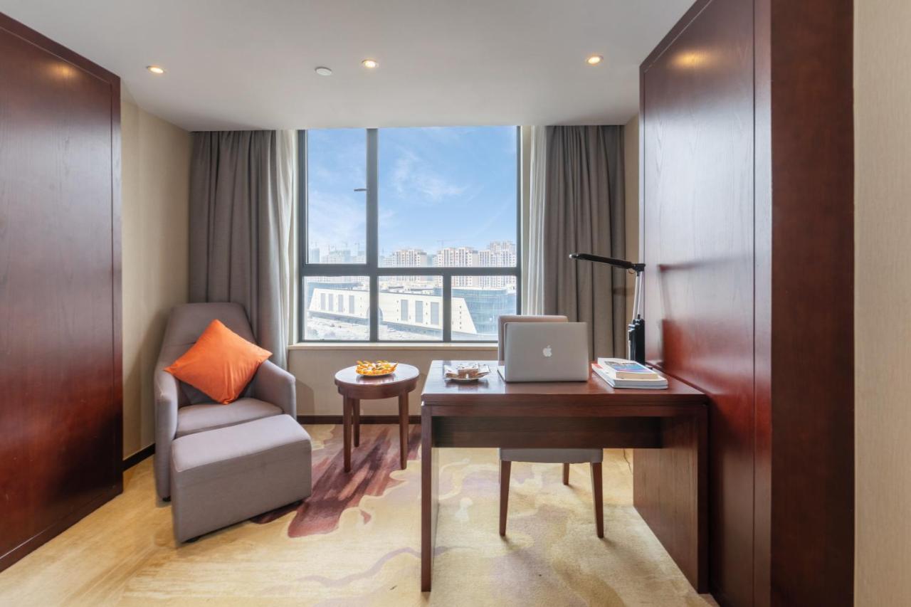 Huzhou Wealth Hotel Bagian luar foto