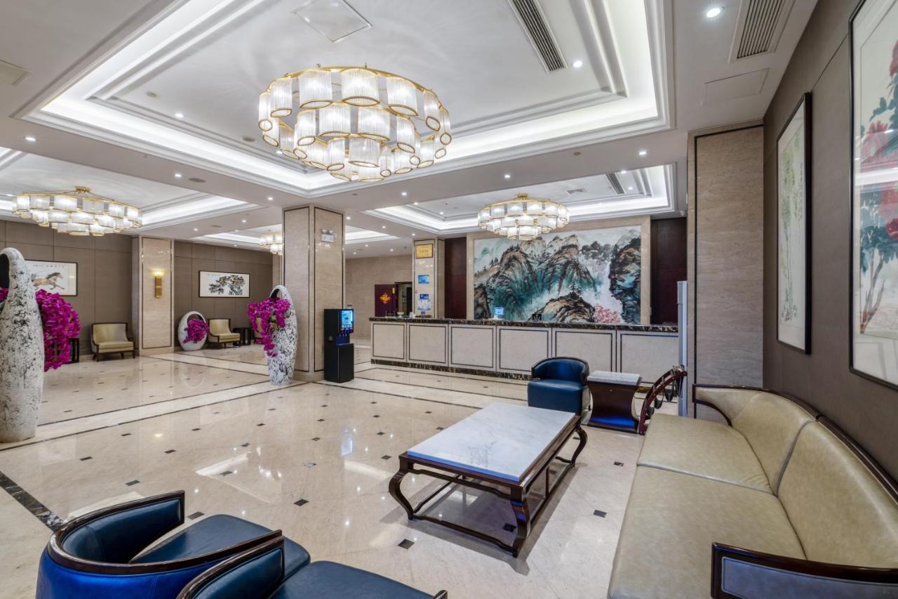 Huzhou Wealth Hotel Bagian luar foto