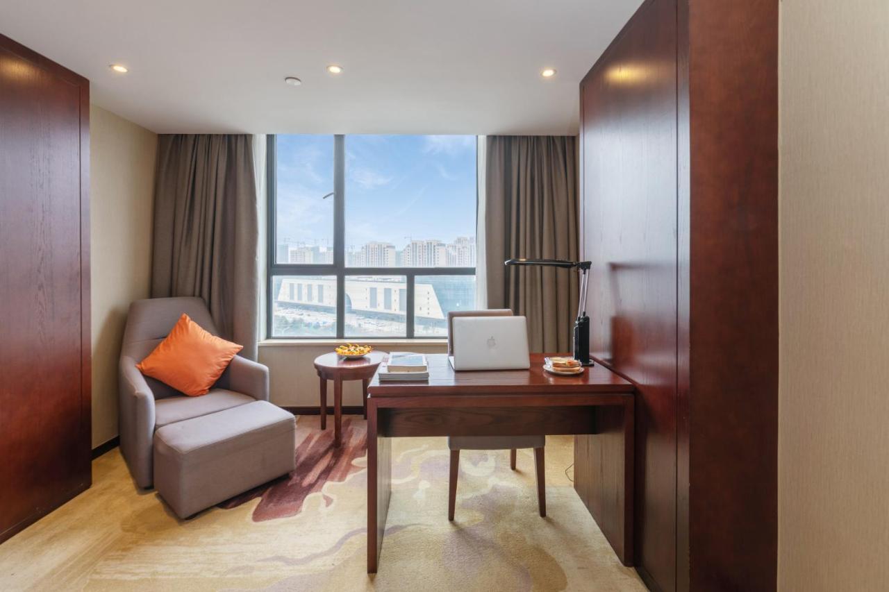 Huzhou Wealth Hotel Bagian luar foto