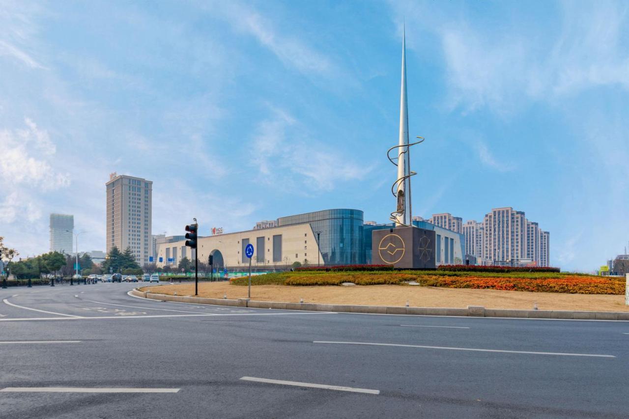 Huzhou Wealth Hotel Bagian luar foto