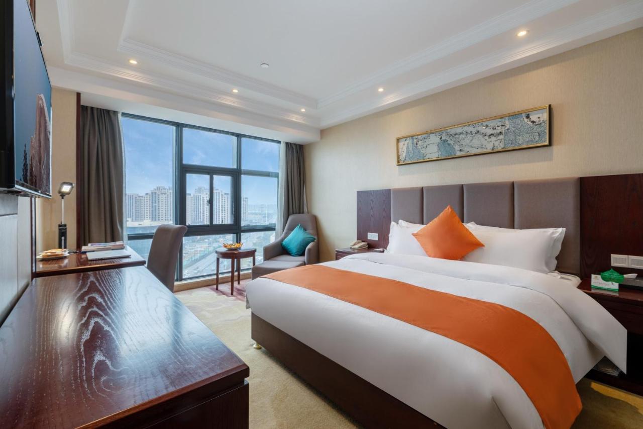 Huzhou Wealth Hotel Bagian luar foto