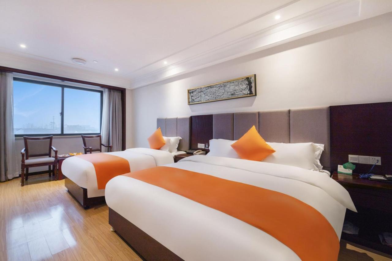 Huzhou Wealth Hotel Bagian luar foto
