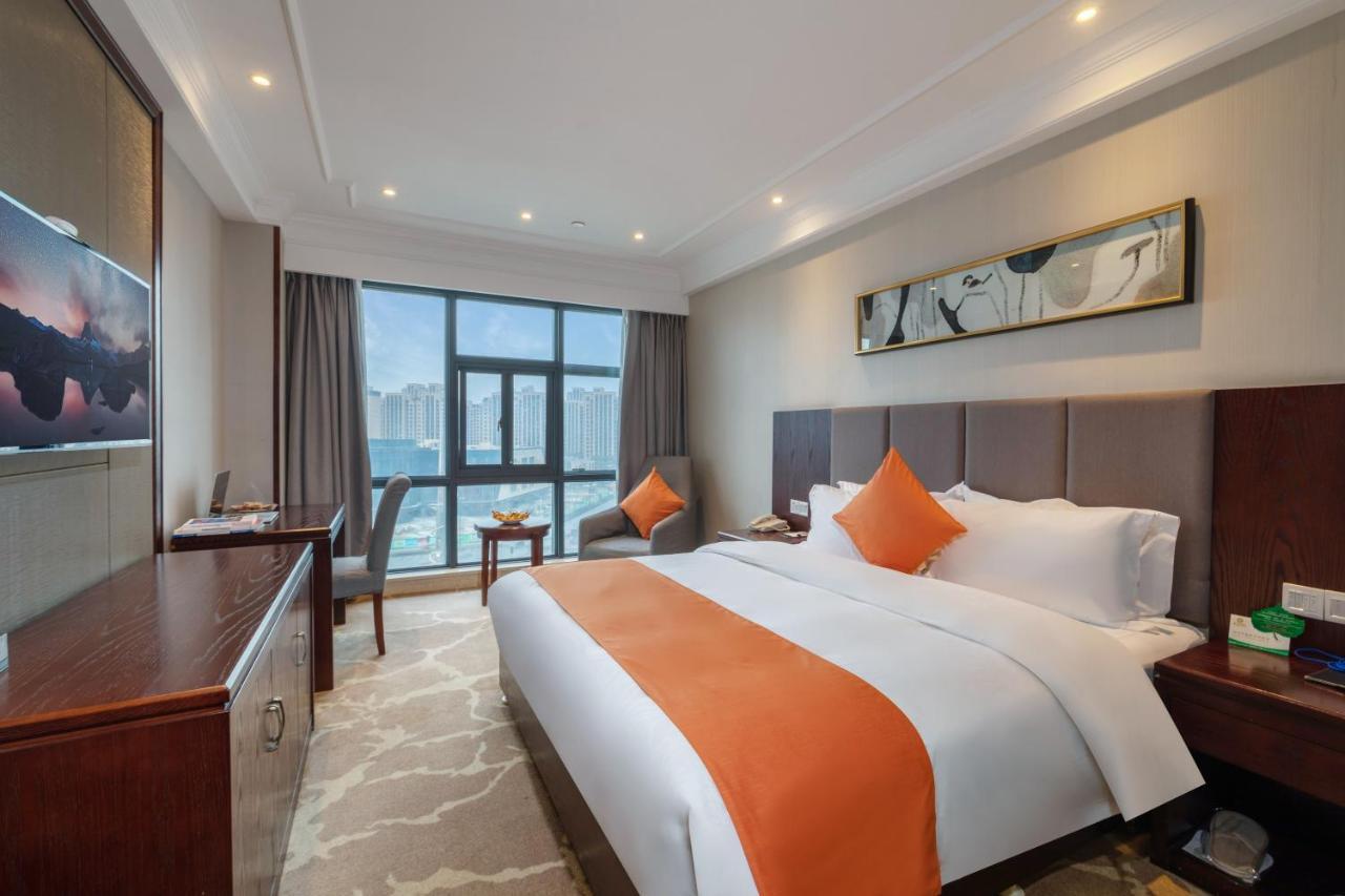 Huzhou Wealth Hotel Bagian luar foto