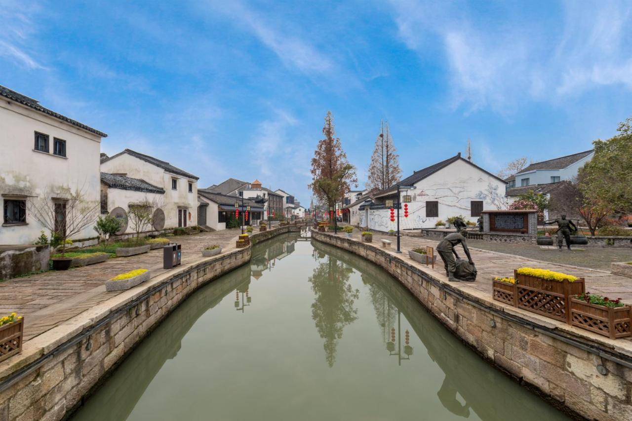 Huzhou Wealth Hotel Bagian luar foto