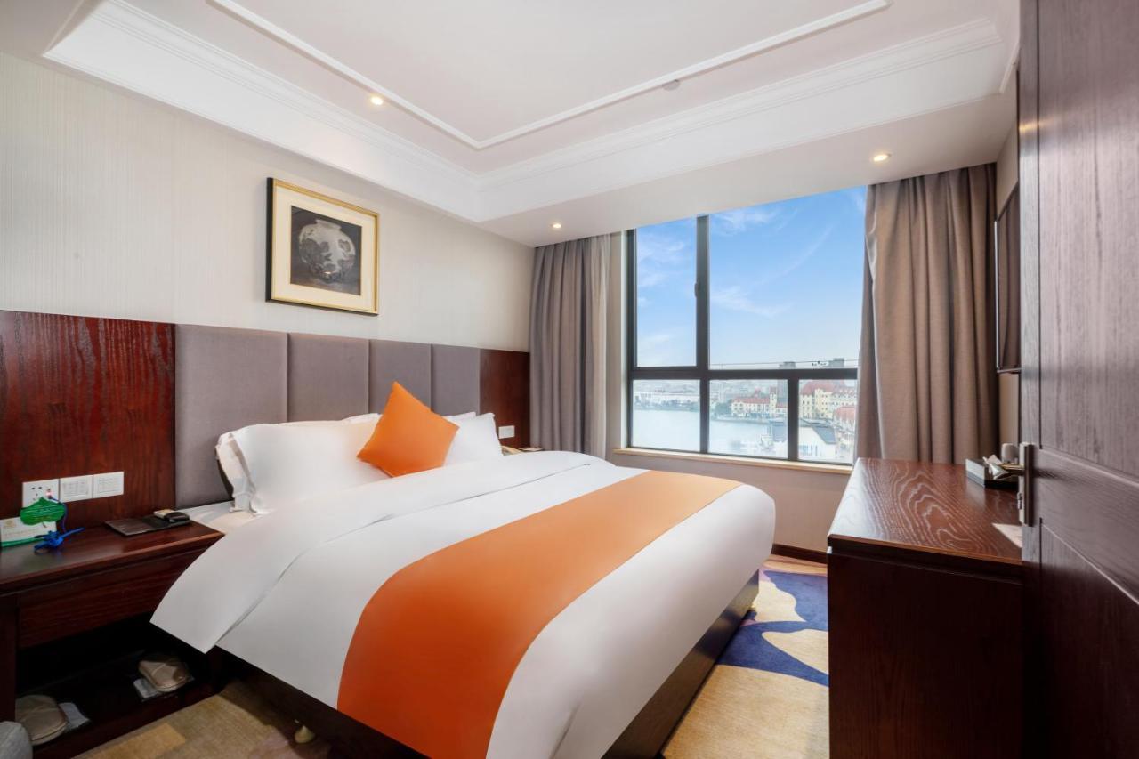 Huzhou Wealth Hotel Bagian luar foto