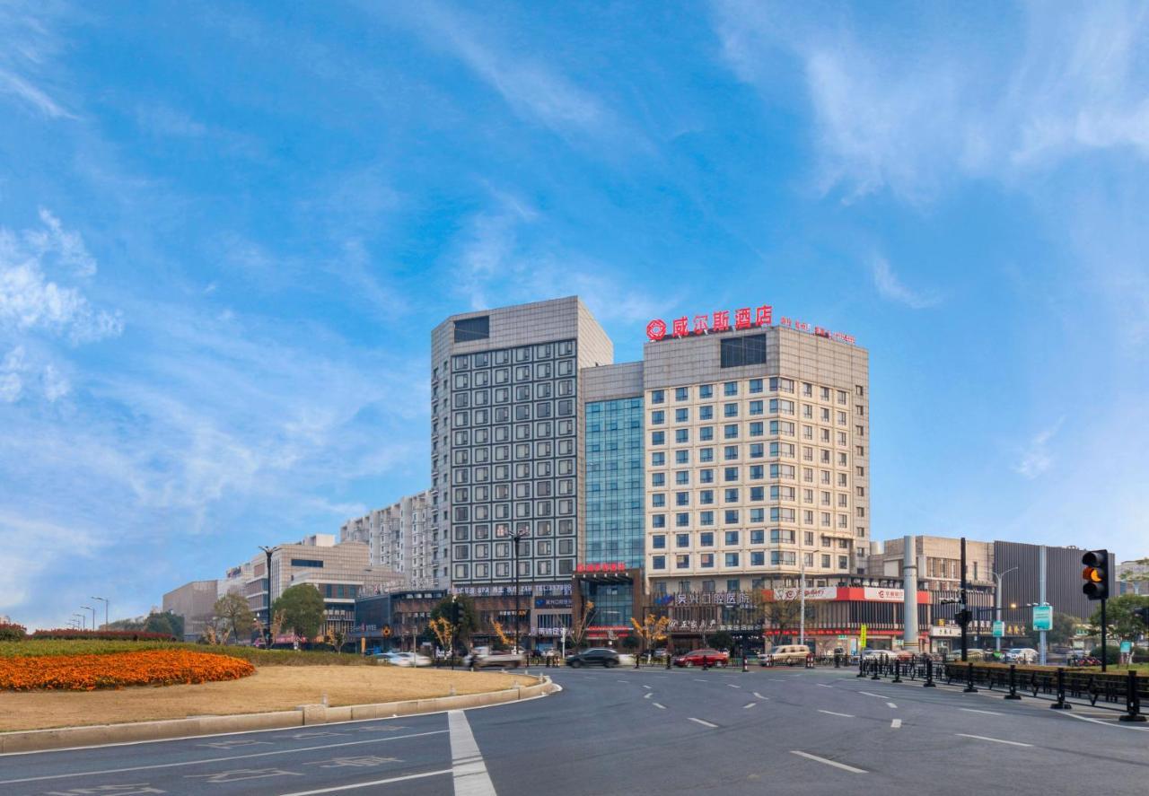 Huzhou Wealth Hotel Bagian luar foto
