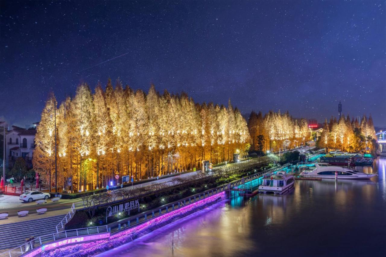 Huzhou Wealth Hotel Bagian luar foto