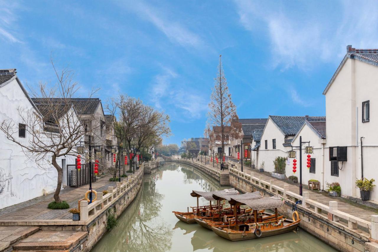 Huzhou Wealth Hotel Bagian luar foto